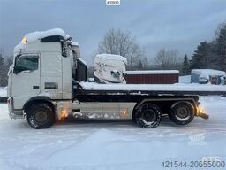 Volvo FH12 snow-plow equipped hook truck with Danish cab