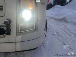 Volvo FH12 snow-plow equipped hook truck with Danish cab