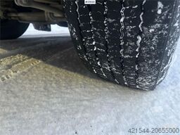 Volvo FH12 snow-plow equipped hook truck with Danish cab