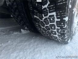 Volvo FH12 snow-plow equipped hook truck with Danish cab