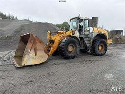 Liebherr L580 wheel loader with a gravel bucket, tooth buck