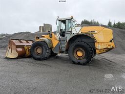 Liebherr L580 wheel loader with a gravel bucket, tooth buck