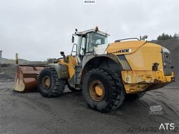 Liebherr L580 wheel loader with a gravel bucket, tooth buck