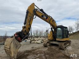 CAT 325FLCR with Engcon rototilt and grading bucket