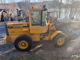 Volvo L50C wheel loader w/ 3 buckets, pallet forks, plow