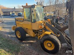 Volvo L50C wheel loader w/ 3 buckets, pallet forks, plow