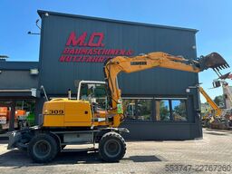 Liebherr A309 Litronic