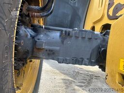 CATERPILLAR TH 406 / 4x4x4 / Greiferschaufel