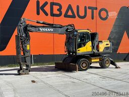 Excavadora de ruedas Volvo EW 210 D NEEDS REPAIR ! / AC / CENTRAL LUBRICATION