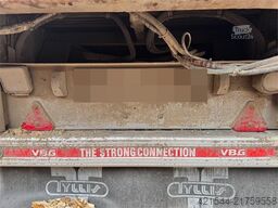 Tyllis wood chip trailer with hydraulic roof.