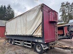 Tyllis wood chip trailer with hydraulic roof.