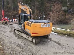 Case CX210D with 2 excavator buckets