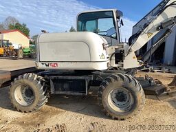Terex TW110 with two-piece offset boom and 3 buckets