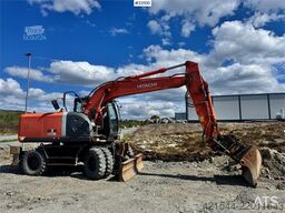 Hitachi ZX140W-3 wheel excavator with Rototilt and grading