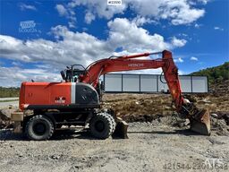 Hitachi ZX140W-3 wheel excavator with Rototilt and grading