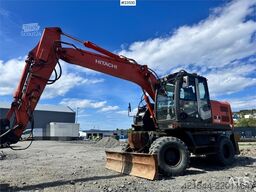 Hitachi ZX140W-3 wheel excavator with Rototilt and grading
