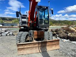 Hitachi ZX140W-3 wheel excavator with Rototilt and grading
