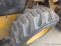 CATERPILLAR 226D3 Lader mit Schwergutschaufel