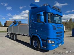 Scania R660 6x4 flatbed truck with rear-mounted 23 tonne-