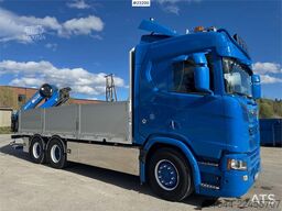 Scania R660 6x4 flatbed truck with rear-mounted 23 tonne-