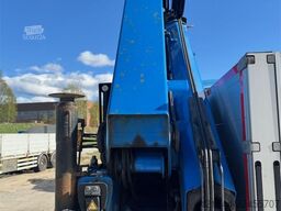 Scania R660 6x4 flatbed truck with rear-mounted 23 tonne-