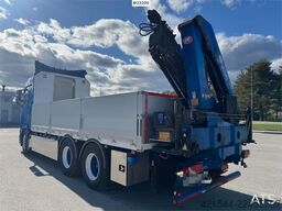 Scania R660 6x4 flatbed truck with rear-mounted 23 tonne-