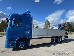 Scania R660 6x4 flatbed truck with rear-mounted 23 tonne-