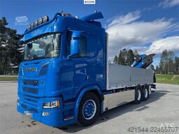 Scania R660 6x4 flatbed truck with rear-mounted 23 tonne-