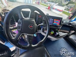 Scania R660 6x4 flatbed truck with rear-mounted 23 tonne-