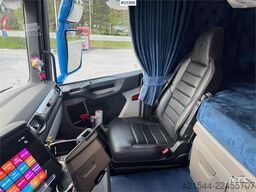 Scania R660 6x4 flatbed truck with rear-mounted 23 tonne-