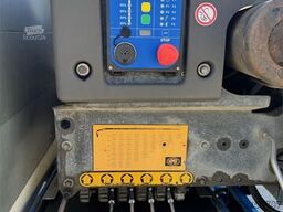 Scania R660 6x4 flatbed truck with rear-mounted 23 tonne-