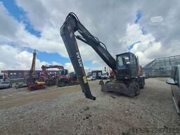 ATLAS 180MH reloading excavator / joysticks