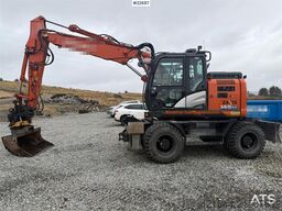 Hitachi zx145W wheeled machine w/ rototilt w/grab box, san