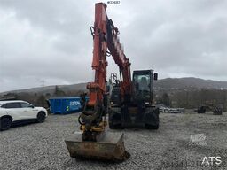Hitachi zx145W wheeled machine w/ rototilt w/grab box, san