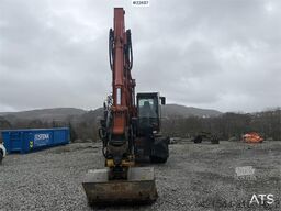 Hitachi zx145W wheeled machine w/ rototilt w/grab box, san