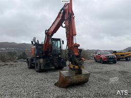 Hitachi zx145W wheeled machine w/ rototilt w/grab box, san