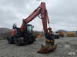 Hitachi zx145W wheeled machine w/ rototilt w/grab box, san