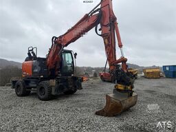 Hitachi zx145W wheeled machine w/ rototilt w/grab box, san