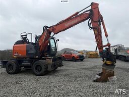 Hitachi zx145W wheeled machine w/ rototilt w/grab box, san