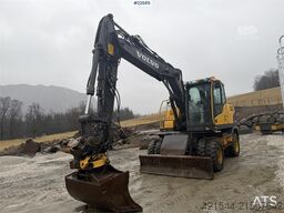 Volvo EW140C wheeled machine w/rototilt, sanding bucket