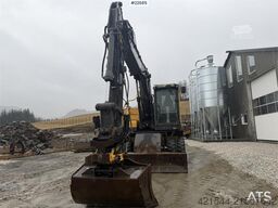 Volvo EW140C wheeled machine w/rototilt, sanding bucket