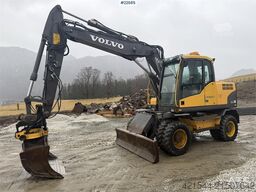 Volvo EW140C wheeled machine w/rototilt, sanding bucket