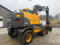 Volvo EW140C wheeled machine w/rototilt, sanding bucket