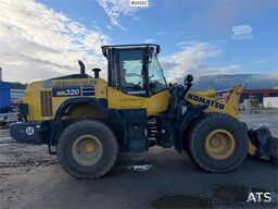 Komatsu WA320-8E0 wheel loader w/ lever steering and a buc