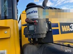 Komatsu WA320-8E0 wheel loader w/ lever steering and a buc