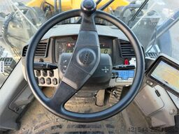 Komatsu WA320-8E0 wheel loader w/ lever steering and a buc