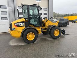 Caterpillar 908M wheel loader with pallet forks and bucket