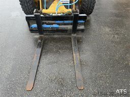 Caterpillar 908M wheel loader with pallet forks and bucket