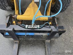 Caterpillar 908M wheel loader with pallet forks and bucket
