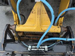 Caterpillar 908M wheel loader with pallet forks and bucket